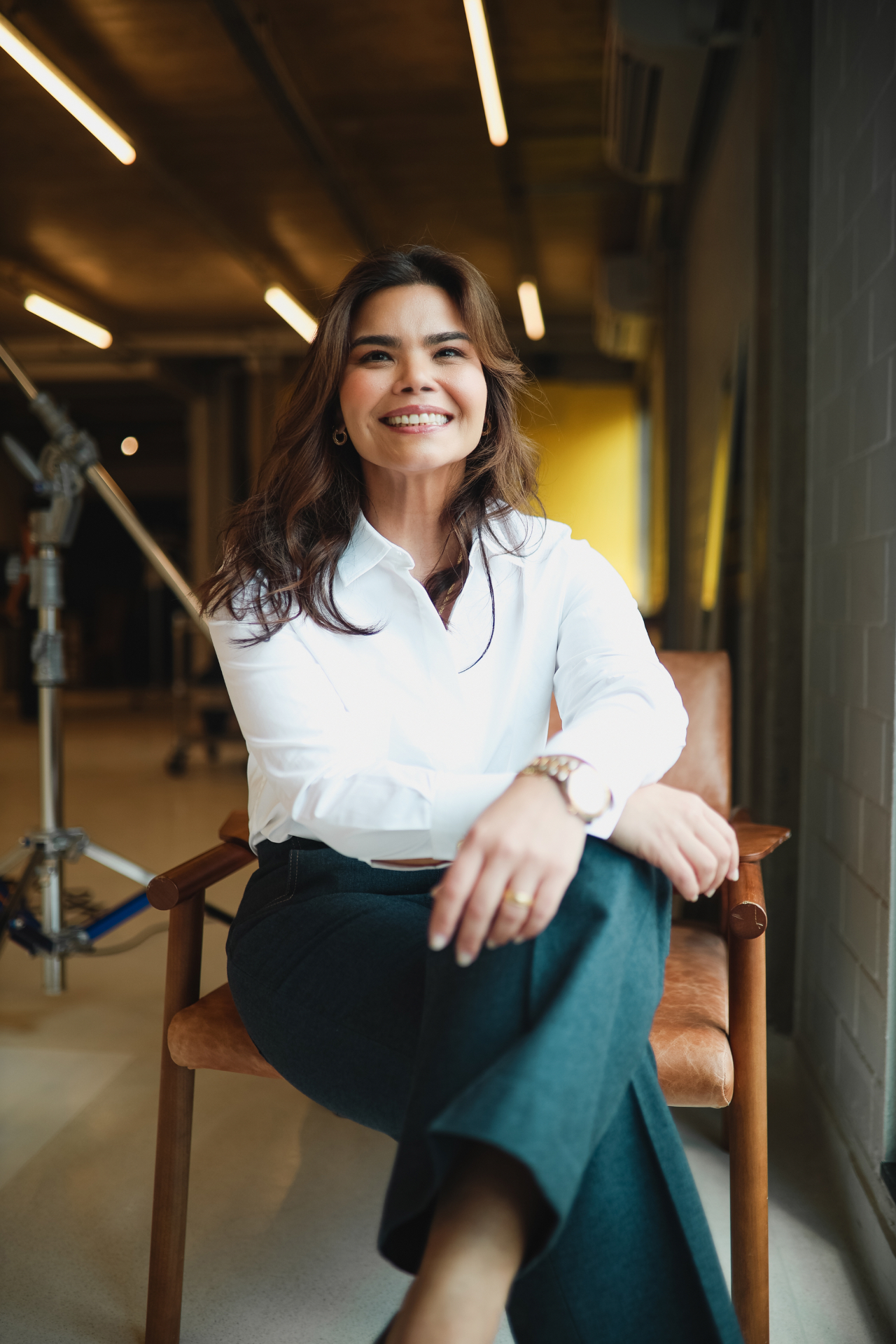 Michelle Tsufa em ambiente corporativo